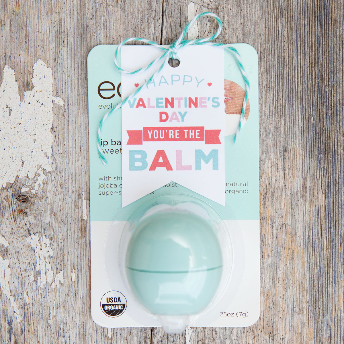 Turn those popular EOS lip balms into fun little Valentine's Day gifts using a short list of supplies and these free printable tags! Makes the perfect gift for friends, teachers and more on your list this Valentine’s Day! 