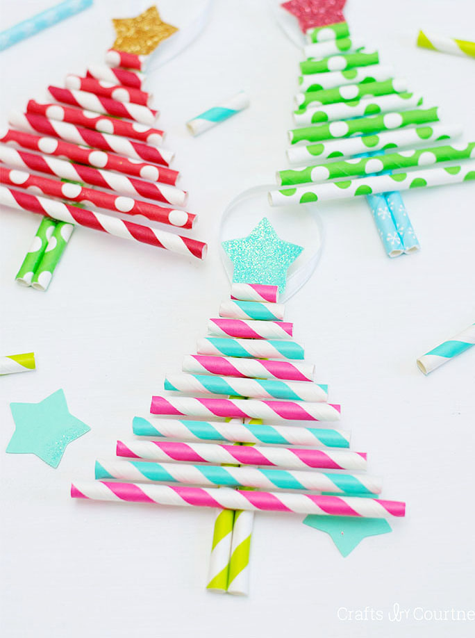 Get crafty with the kids this holiday season with these darling decorative paper straw christmas tree ornaments!