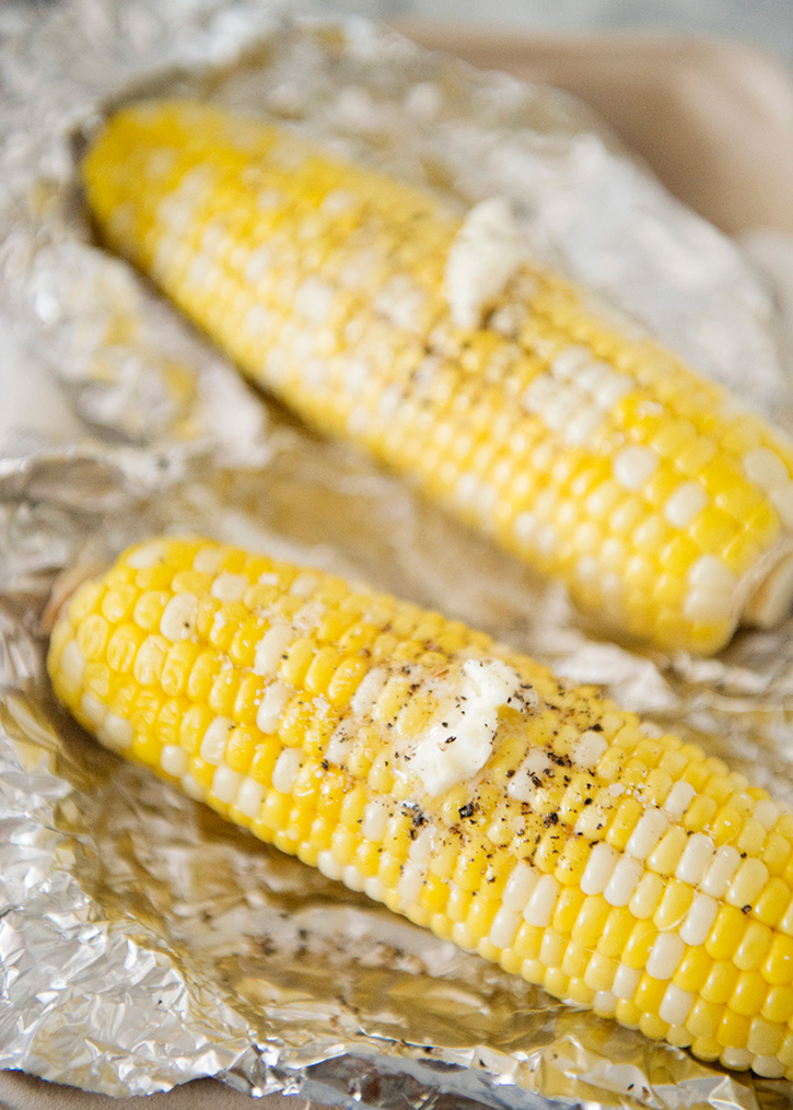 This slow cooker corn on the cob is the easiest way to cook corn. Keep your kitchen cool by cooking large amounts of corn in the slow cooker all summer long.