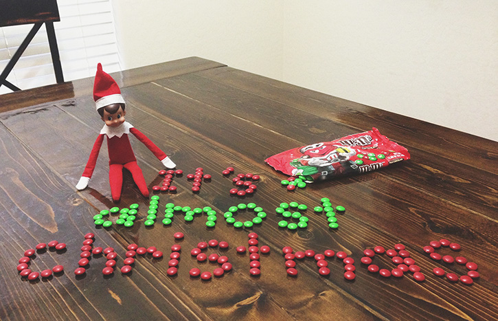 Elf leaves a message using M & M's.