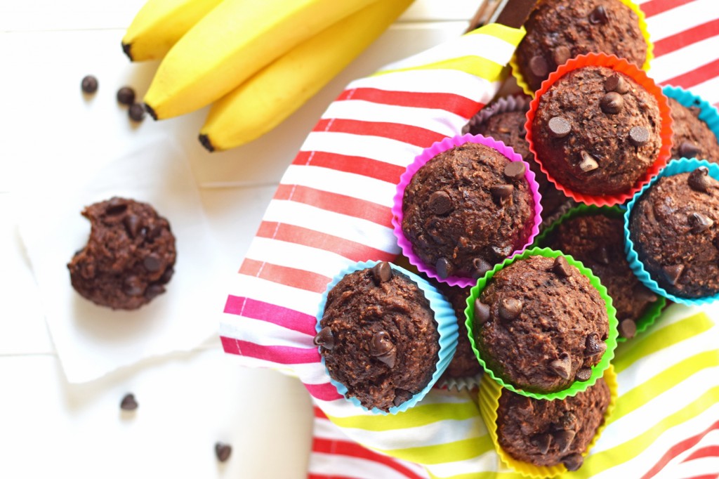 Healthy Chocolate Banana Muffins - You'd never guess these moist, chocolaty muffins are refined sugar free and full of healthy whole grains. Perfect for a healthy breakfast on the go!