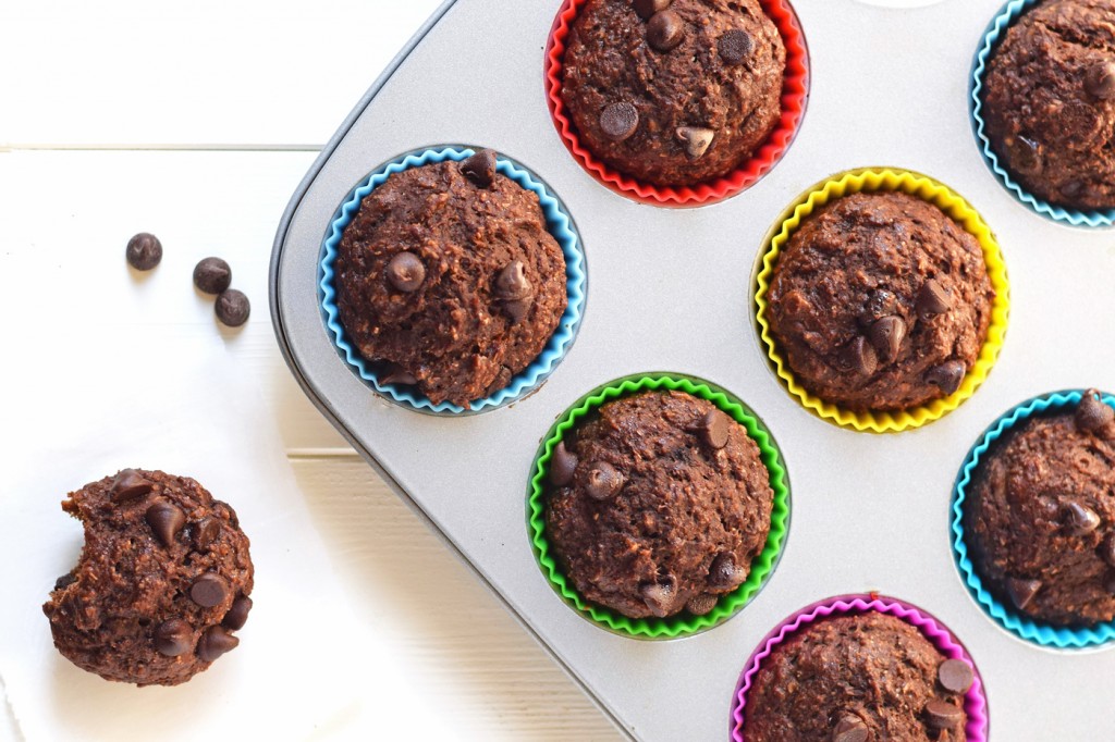 Healthy Chocolate Banana Muffins - You'd never guess these moist, chocolaty muffins are refined sugar free and full of healthy whole grains. Perfect for a healthy breakfast on the go!
