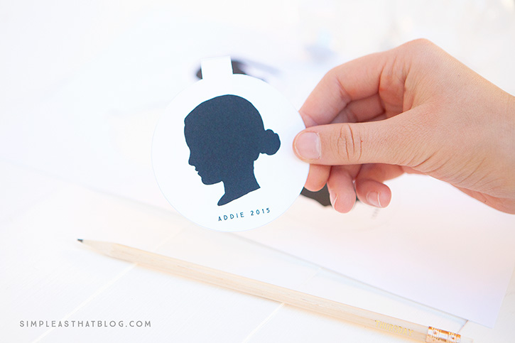 These simple, DIY, silhouette keepsake ornaments will help you capture a moment in time as you display your children's profiles year after year on your Christmas tree.