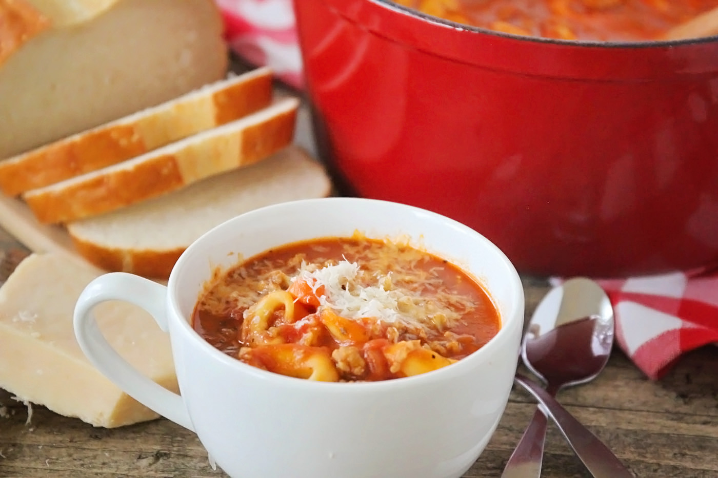 If you're short on time and looking for a warm, hearty meal to serve your family this week, you need to try this Quick and Easy Tomato Tortellini Soup Recipe!