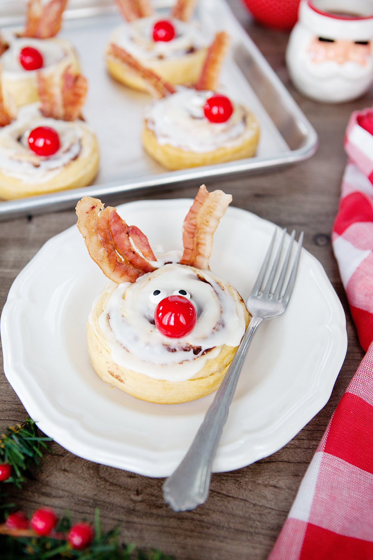 These Rudolph the Red-Nosed Reindeer Cinnamon Rolls will help make the holidays a bit more magical with minimal effort required!