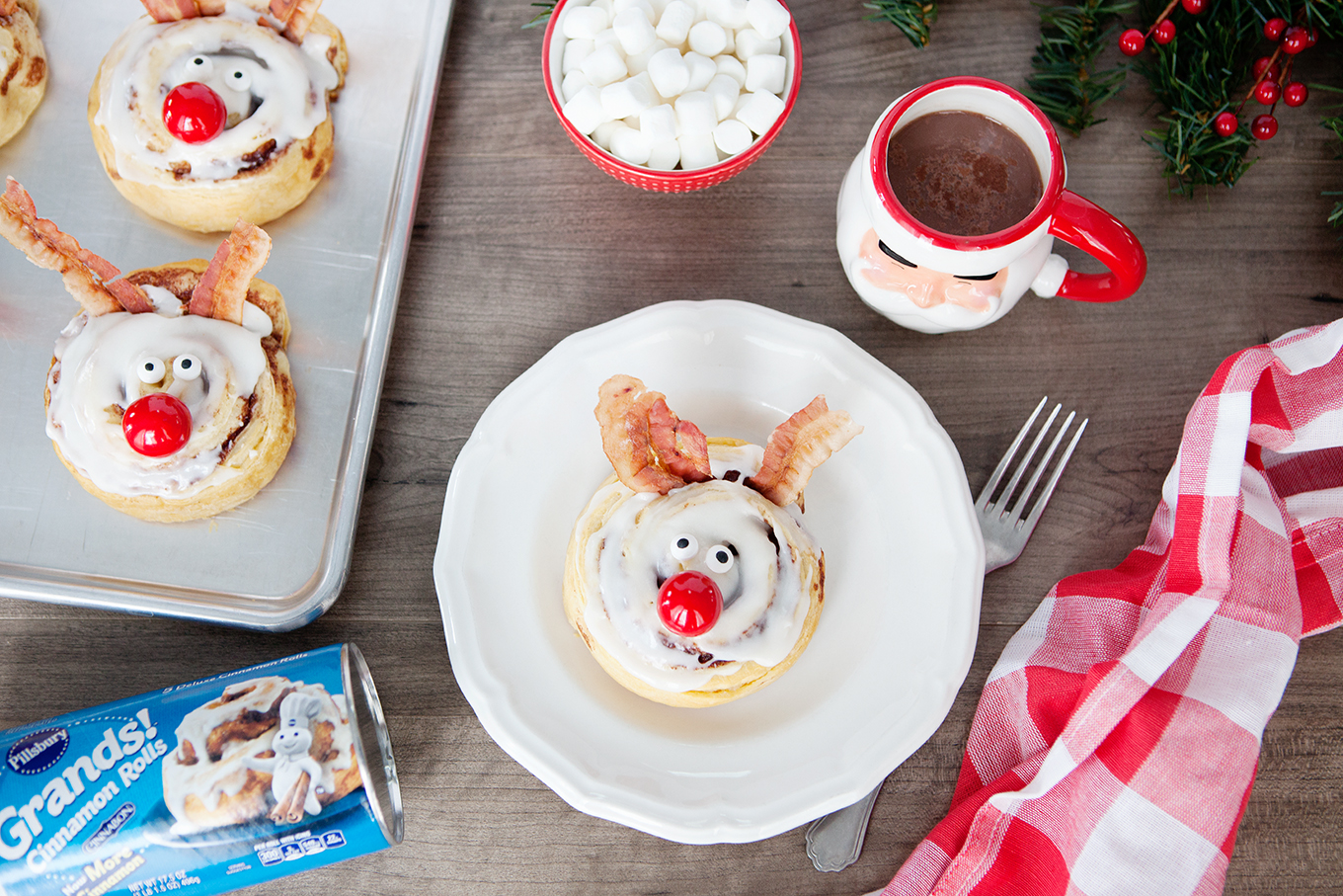 These Rudolph the Red-Nosed Reindeer Cinnamon Rolls will help make the holidays a bit more magical with minimal effort required!