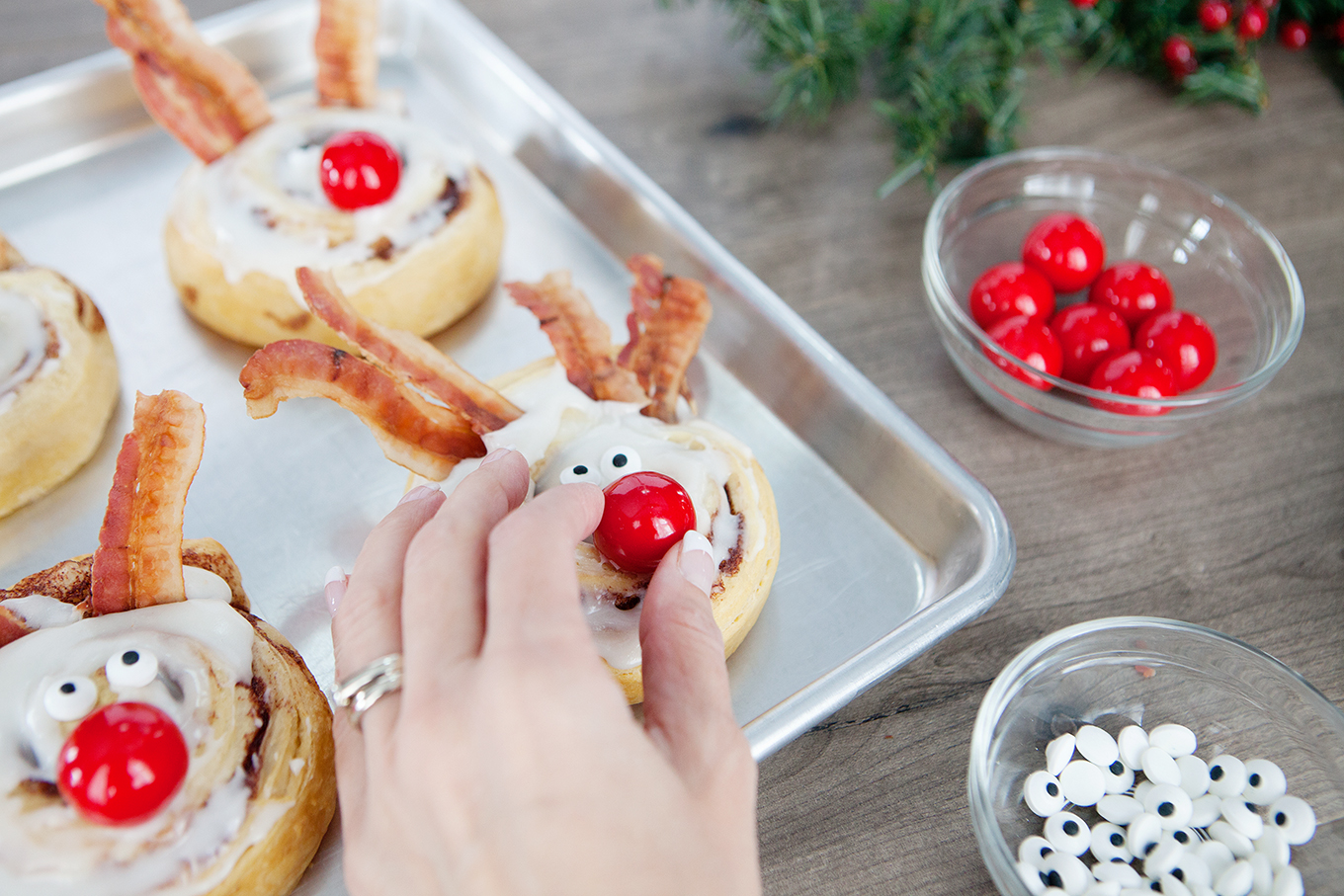 These Rudolph the Red-Nosed Reindeer Cinnamon Rolls will help make the holidays a bit more magical with minimal effort required!