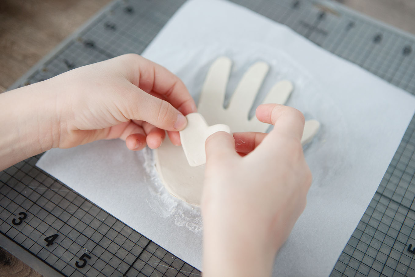 Child's handprint jewelry holder made out of clay.