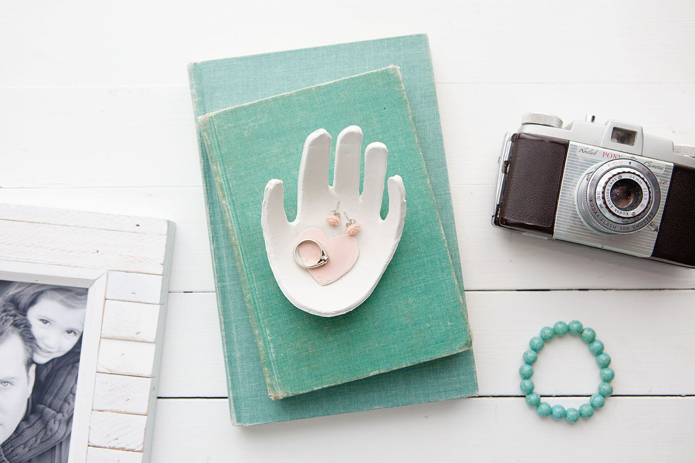 Create a keepsake handprint jewelry dish out of clay using your child's hand – they're easy to make and are a darling gift idea to keep in mind for Mother's Day. These sweet little dishes are guaranteed to melt any Mom or Grandma's heart.