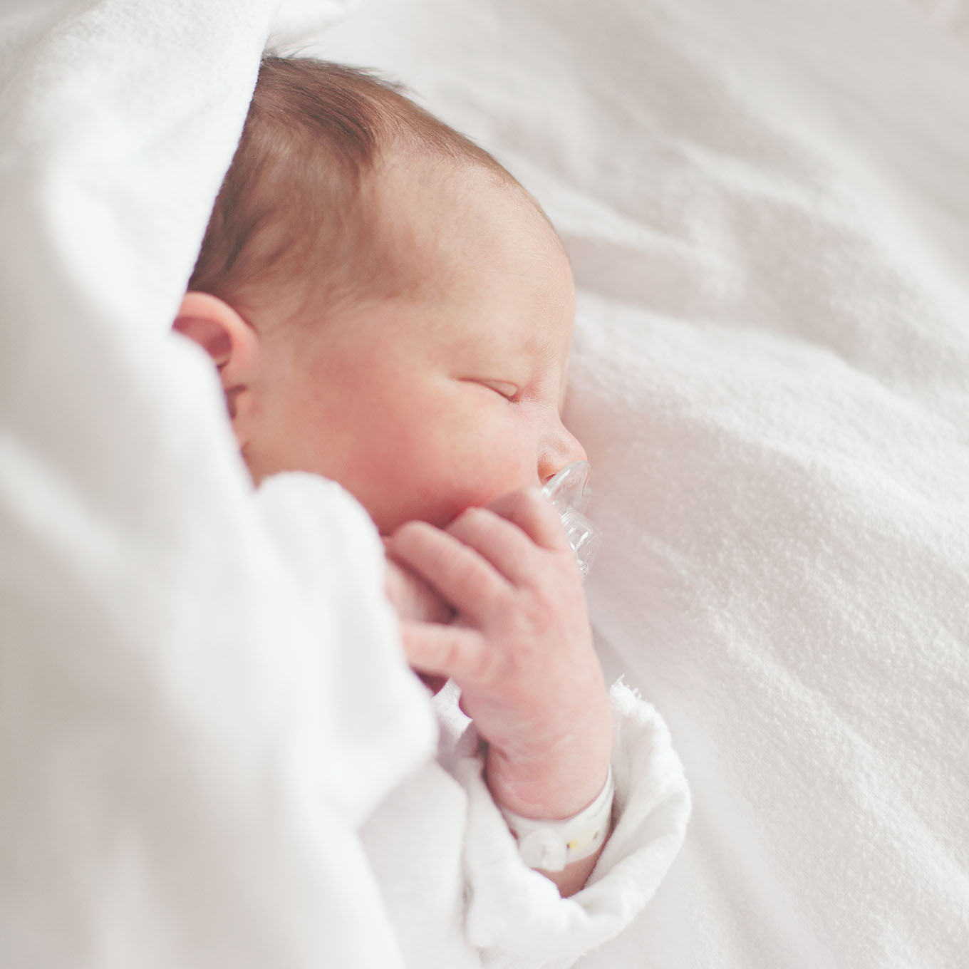 Your baby is so fresh and innocent—and this stage so fleeting. Here's how to improve your newborn photography while you still have a newborn in your arms.