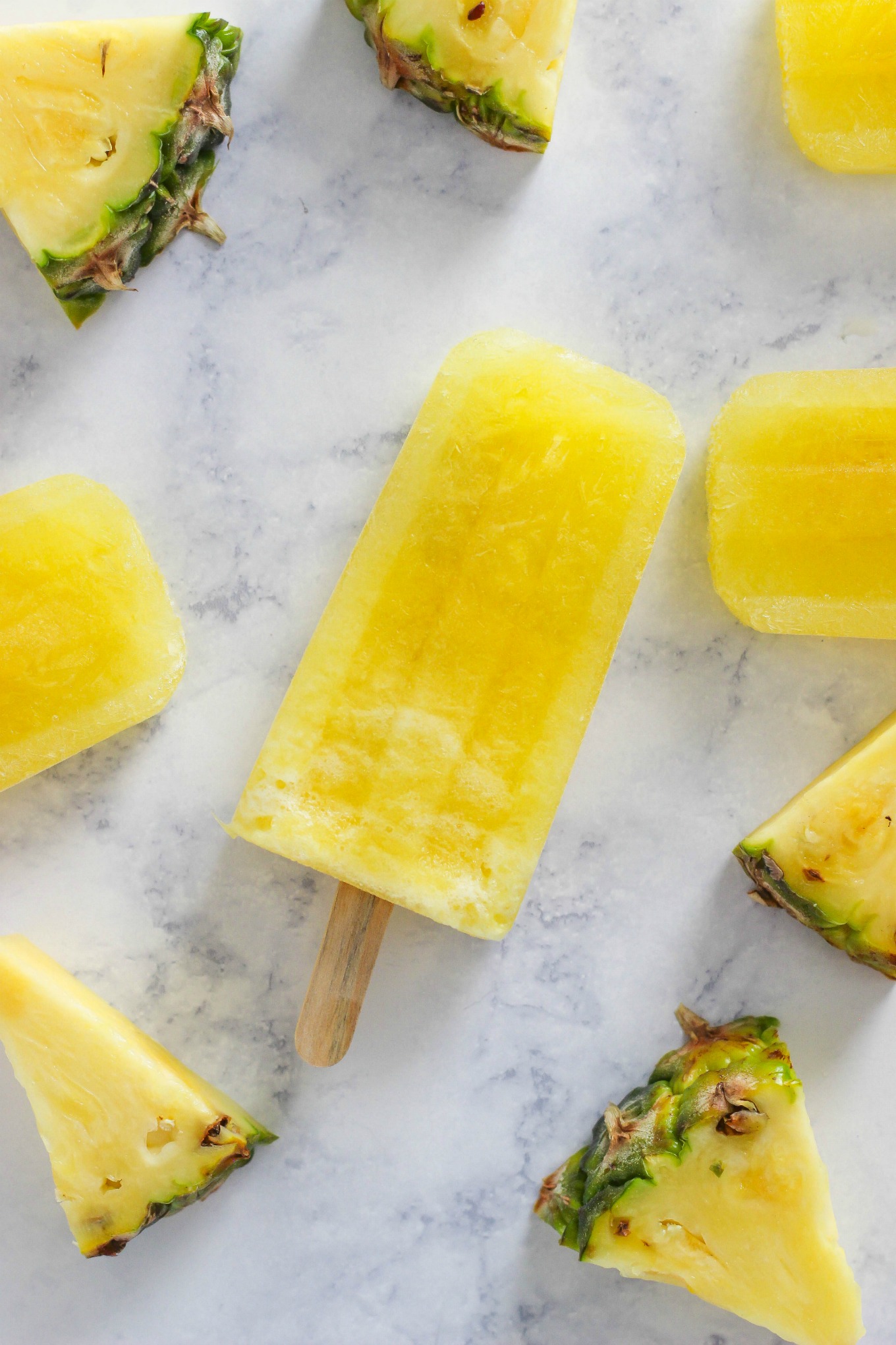 These 3 ingredient Pineapple Lemonade Popsicles are a refreshing and incredibly delicious sweet summer treat recipe.