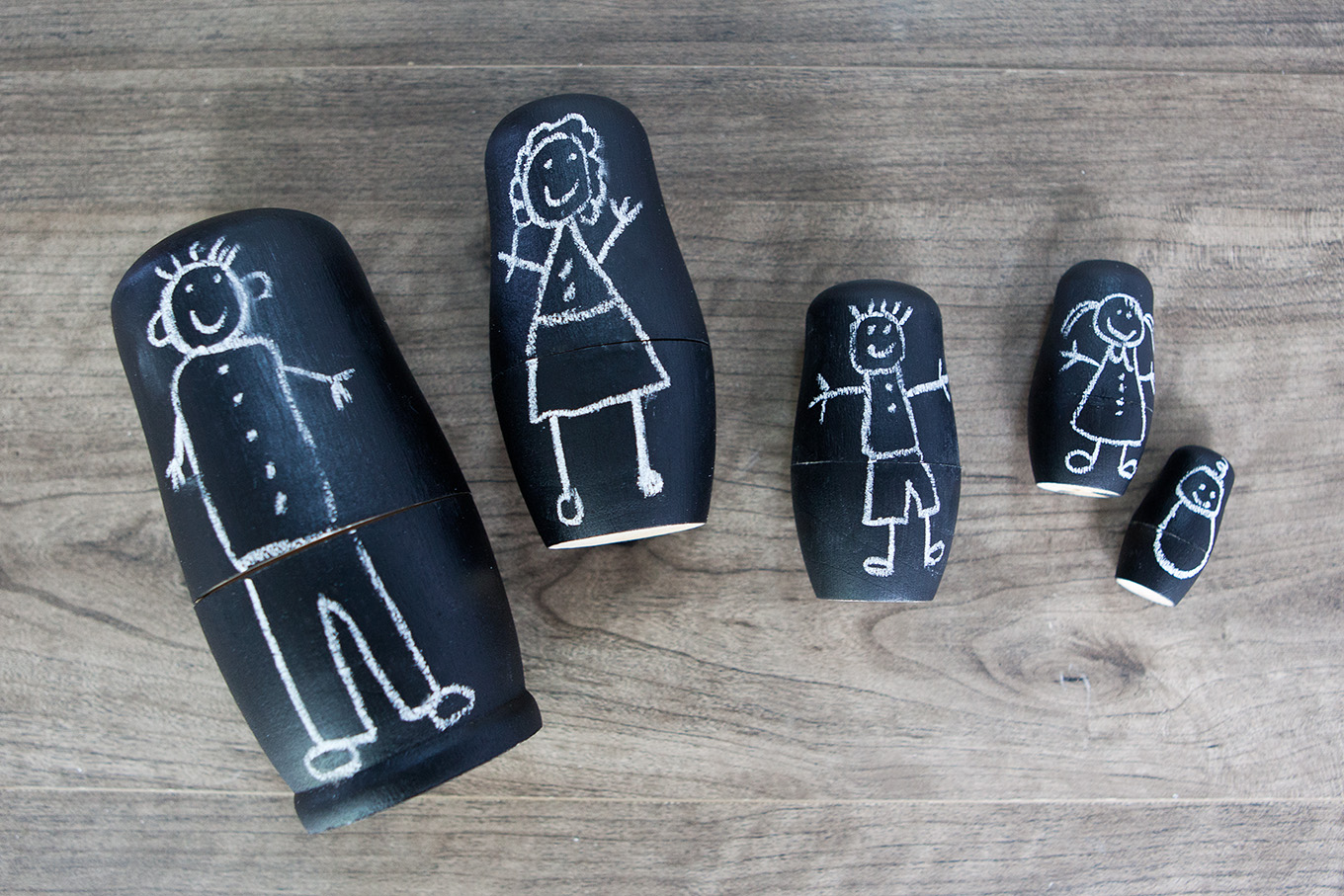 These DIY Chalkboard Matryoshka Nesting Dolls are an adorable, handmade toy your kids will love making! They can personalize the dolls again and again with nothing more than a piece of chalk.