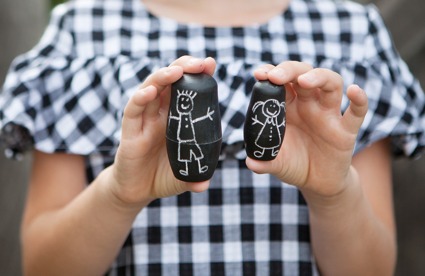 These DIY Chalkboard Matryoshka Nesting Dolls are an adorable, handmade toy your kids will love making! They can personalize the dolls again and again with nothing more than a piece of chalk.