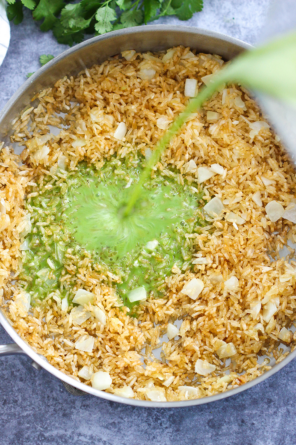 Mexican Green Rice (Arroz Verde) Recipe. Easy to prepare and delicious, this classic Mexican side dish is another great way to incorporate an extra serving of veggies into your family's next meal!
